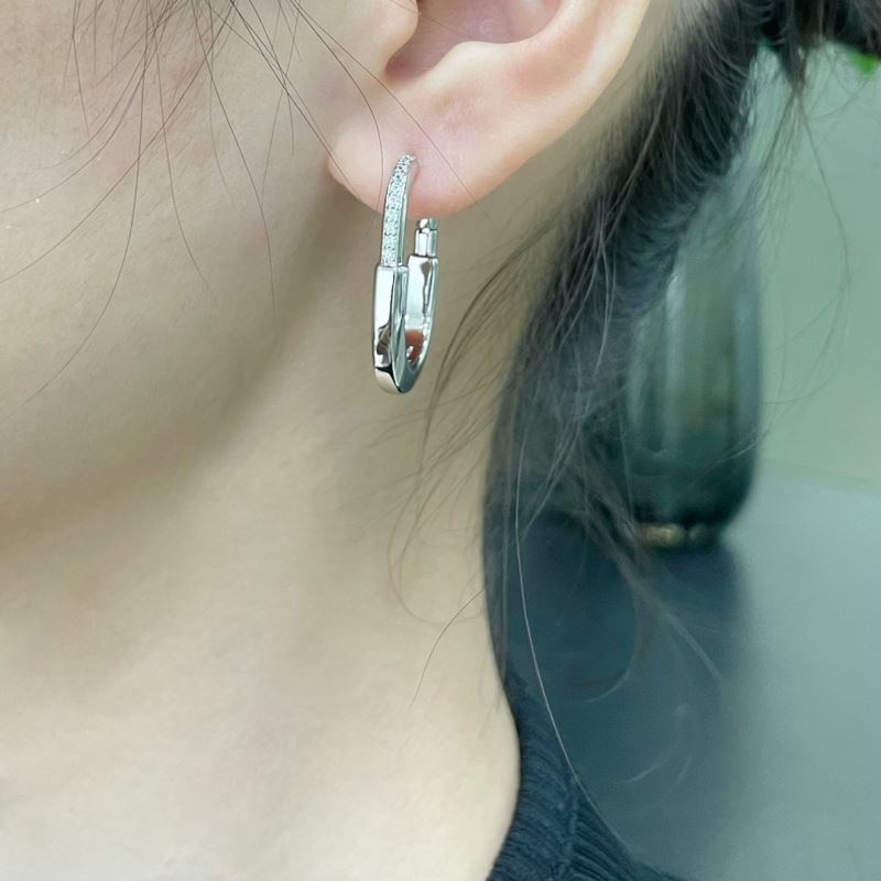 T*f*ny earrings